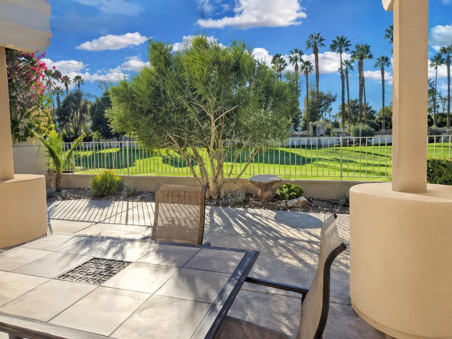 The back patio features beautiful mountain and golf course views!
