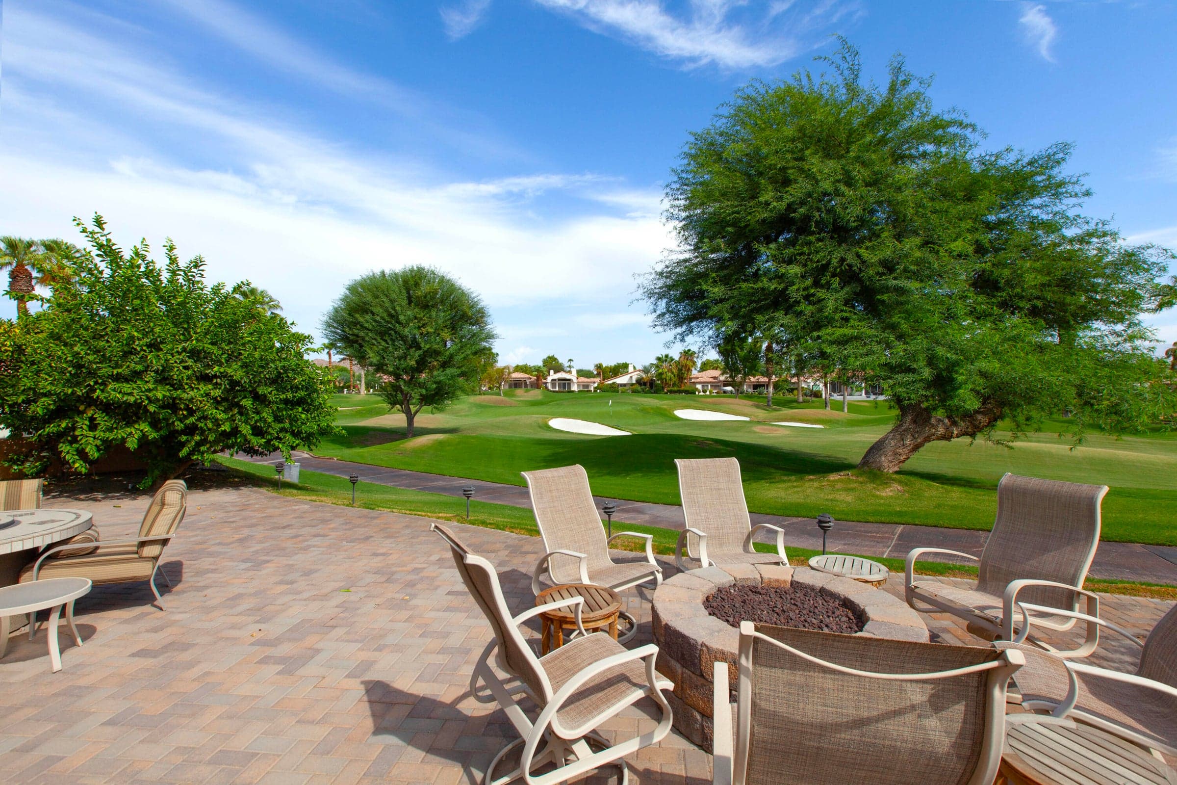 Sited near 15th green and lake of Robert Trent Jones Course