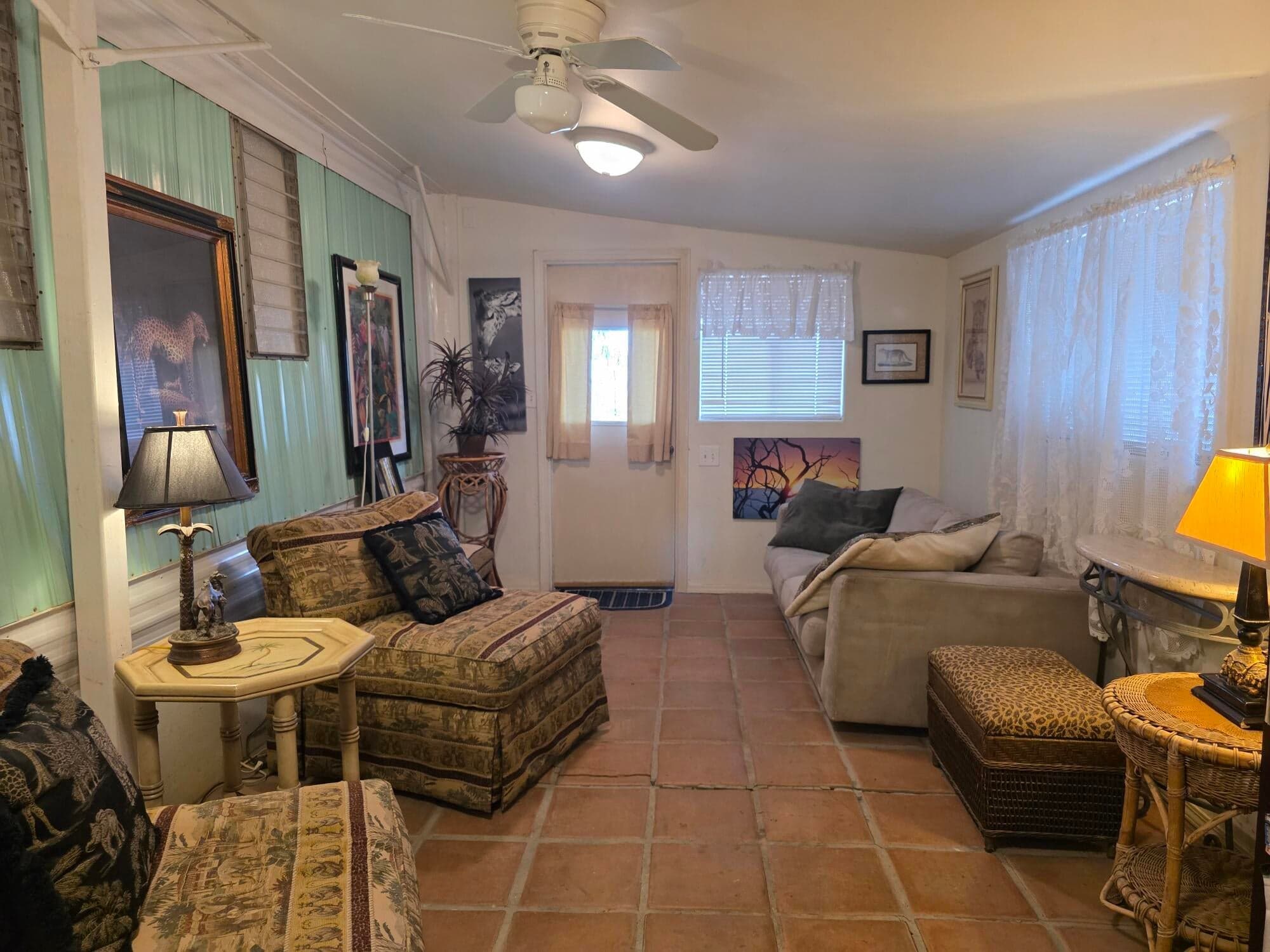 Vintage Manufactured Homes attached enclosed sitting area entrance room