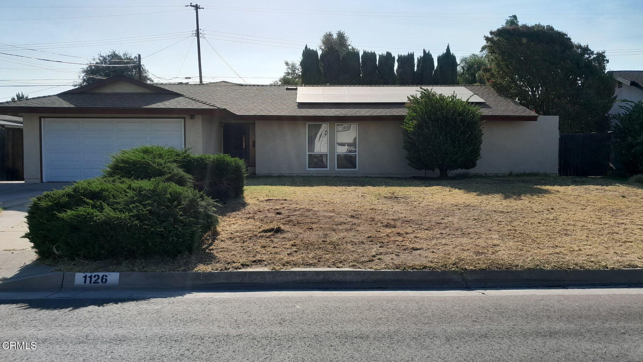 1126 S Gretta Ave - Front photo wo tree