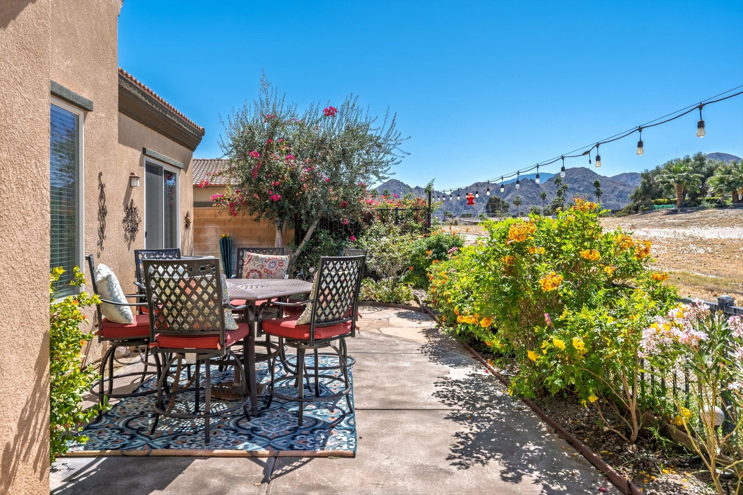 Mountain Views! Sunsets await. Paved flagstone patio