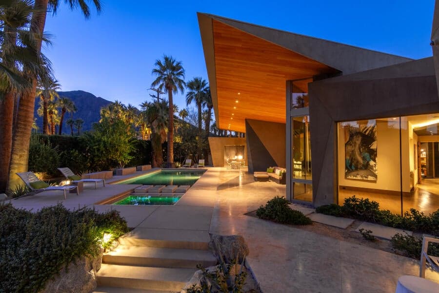Twilight shot of the soaring dramatic floating roof in keeping with the overall architectural design.