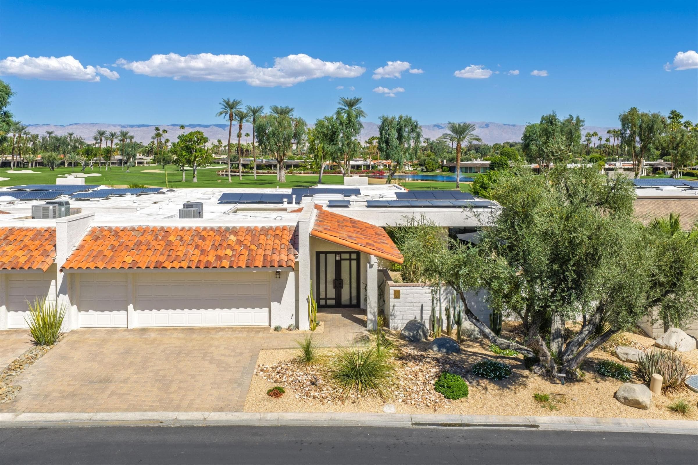 Great curb appeal - paver driveway, walkway and desertscape