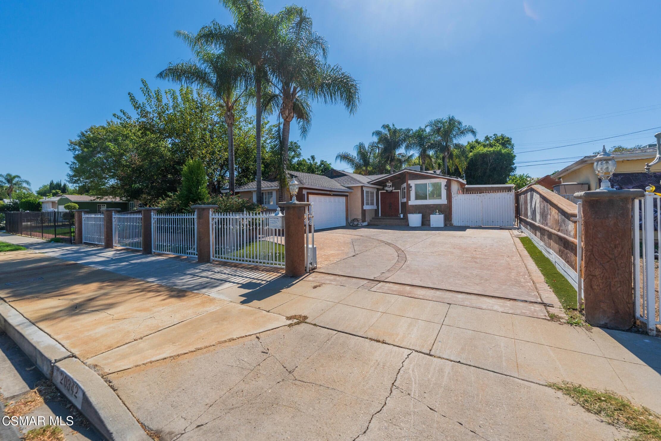 Gated home with lots of parking